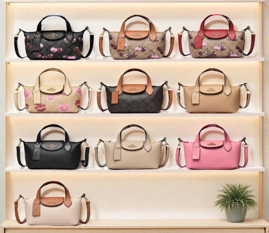 Bolso con broche COACH