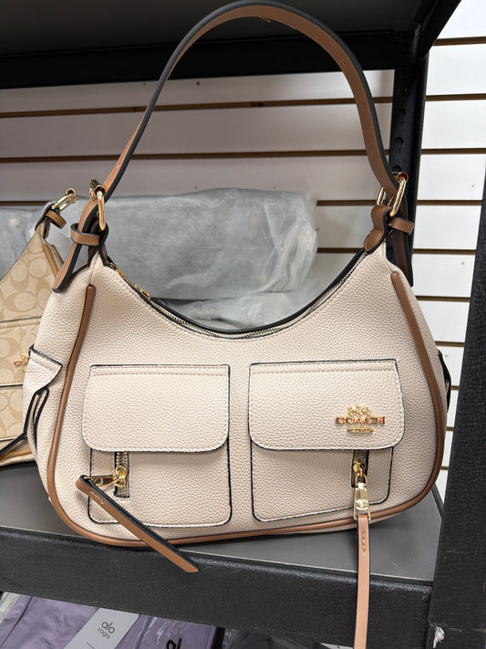 Bolsa media luna coach