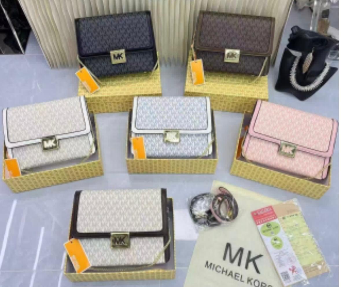 Bolsa MK Monograma en caja