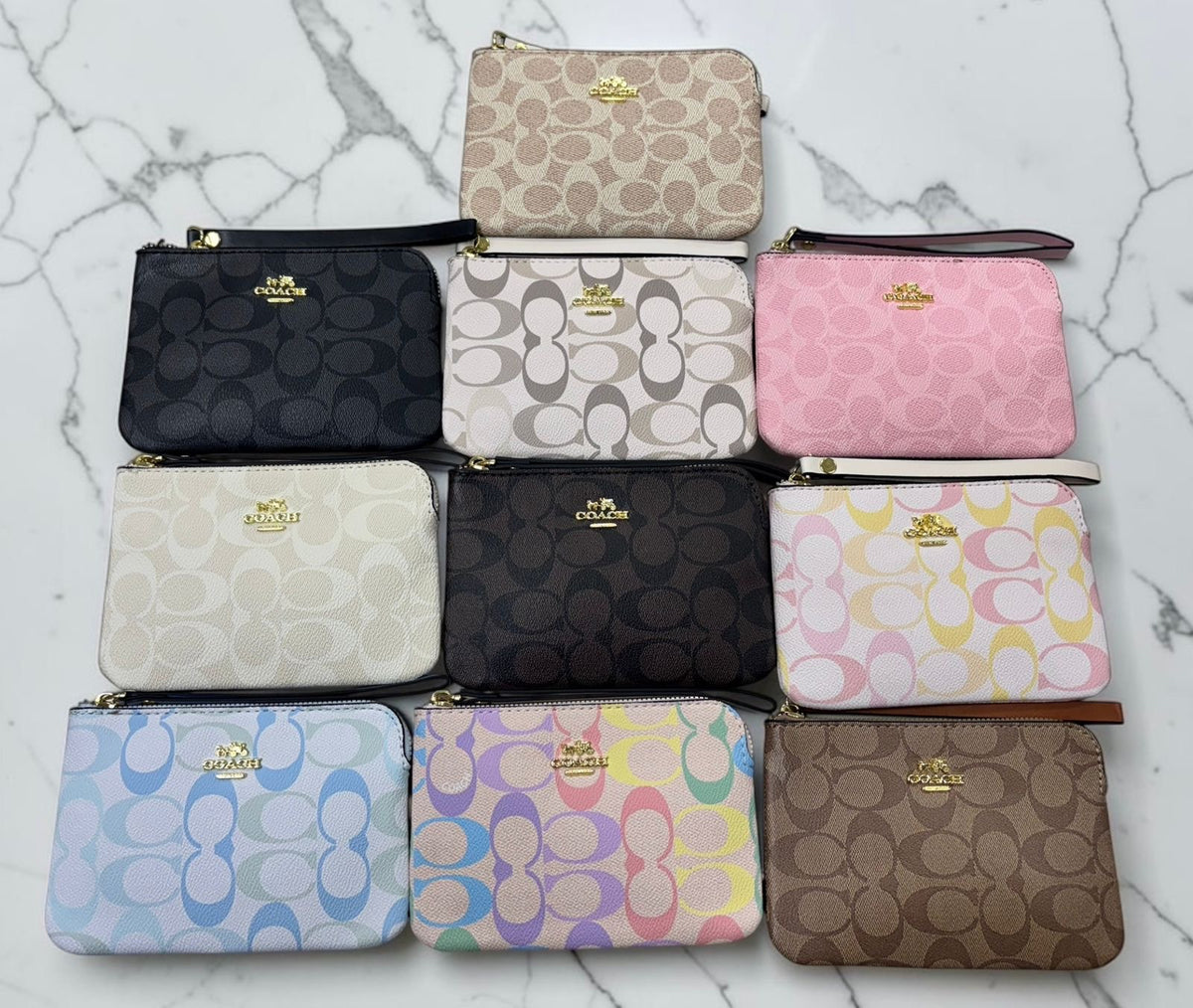 Muñequera Coach surtida