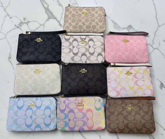 Muñequera Coach surtida